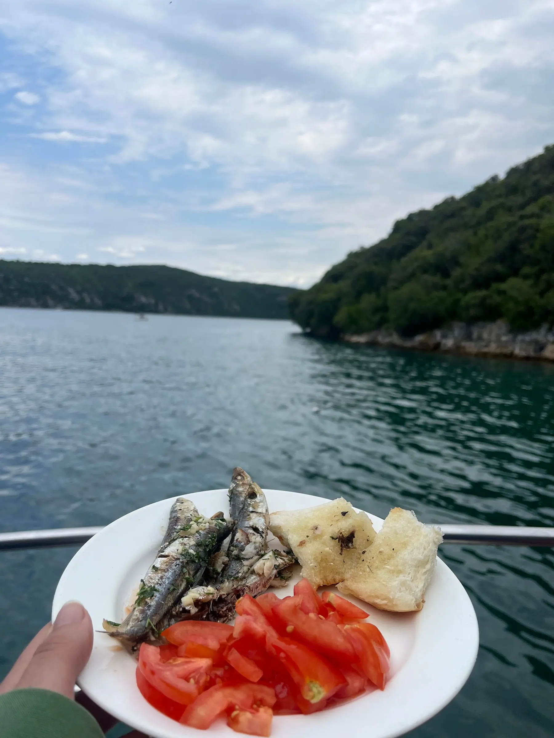 Freshly grilled sardines prepared onboard for lunch