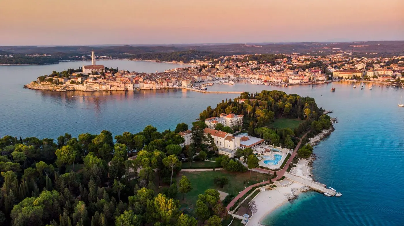 Aerial view of Rovinj's old town and the islands at golden hour